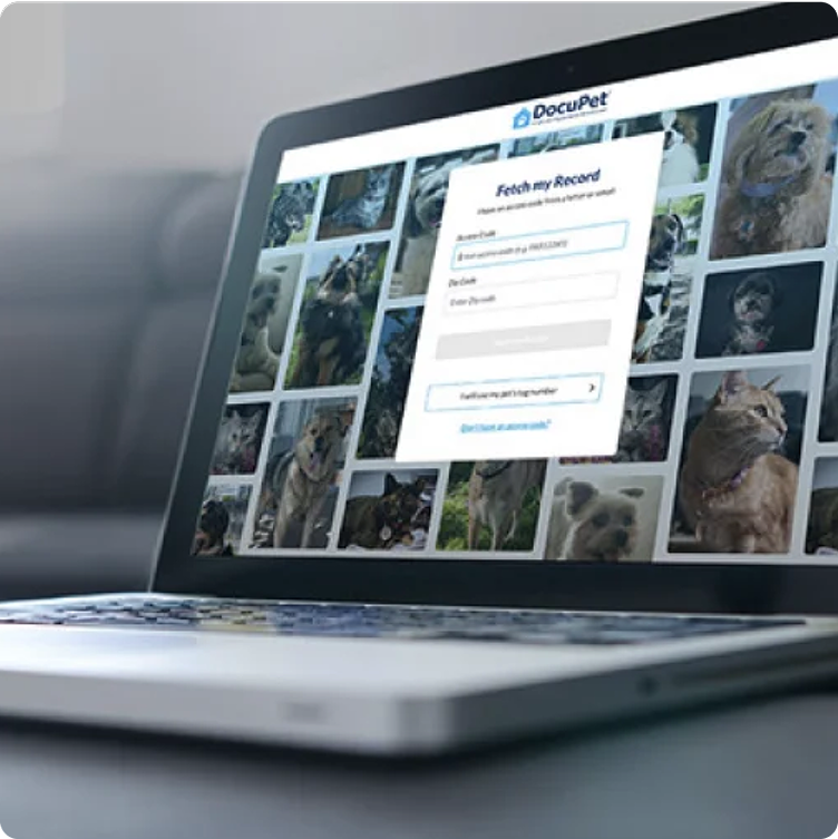 A laptop displays DocuPet's website